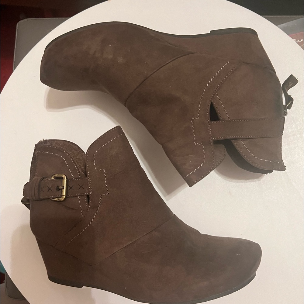 Brown suede ankle boots.